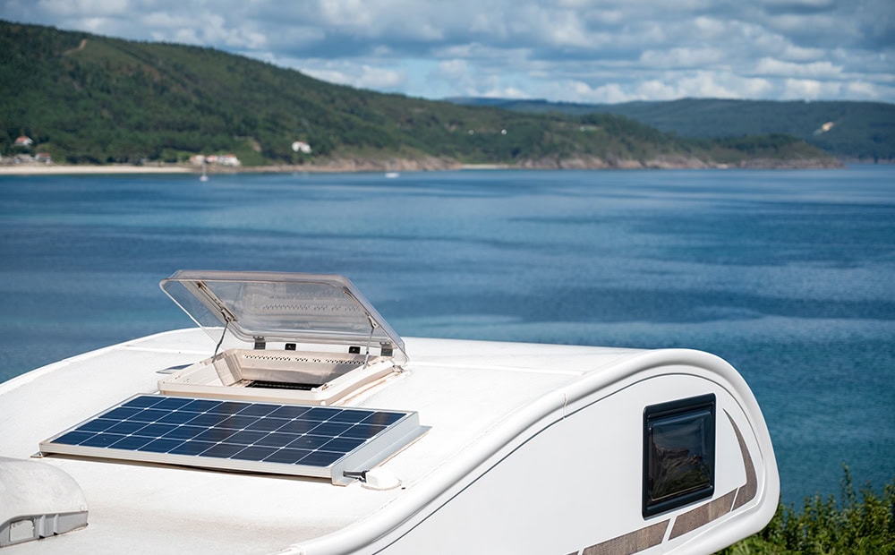 Boat with flexible solar panels